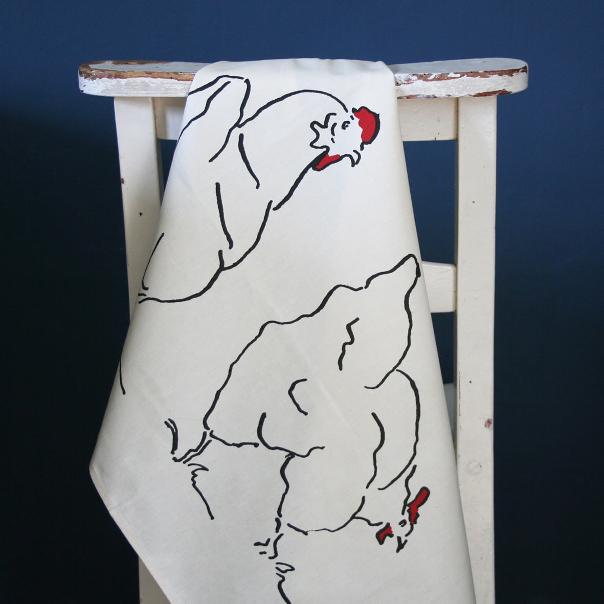 chicken tea towel from cluck cluck over a chair