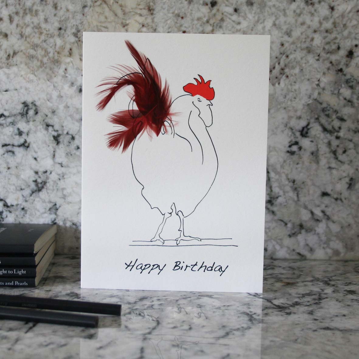 Herk Cockerel happy birthday card with red feathers
