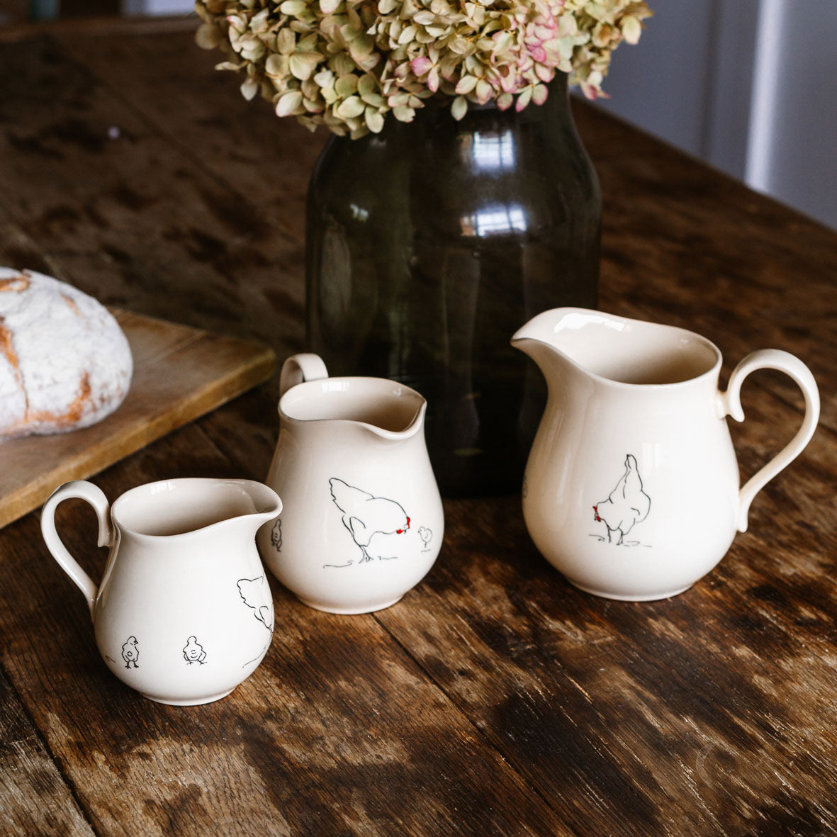 cream jugs with hen design