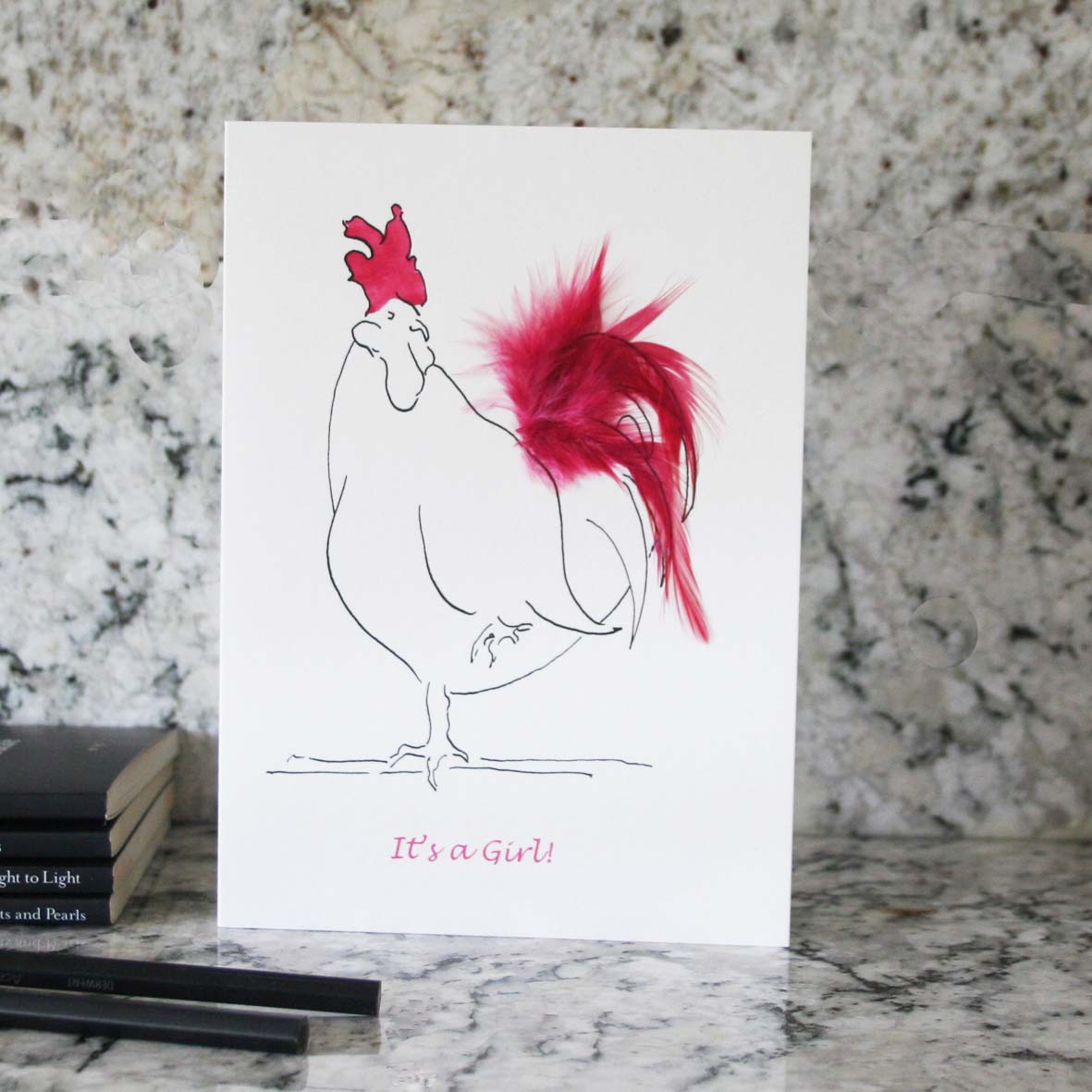 It's a girl greeting card with real feathers