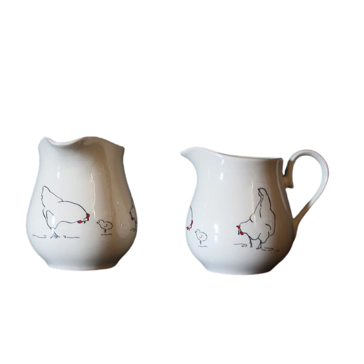 creamwear jugs with drawings of chickens, hens and chicks going round them