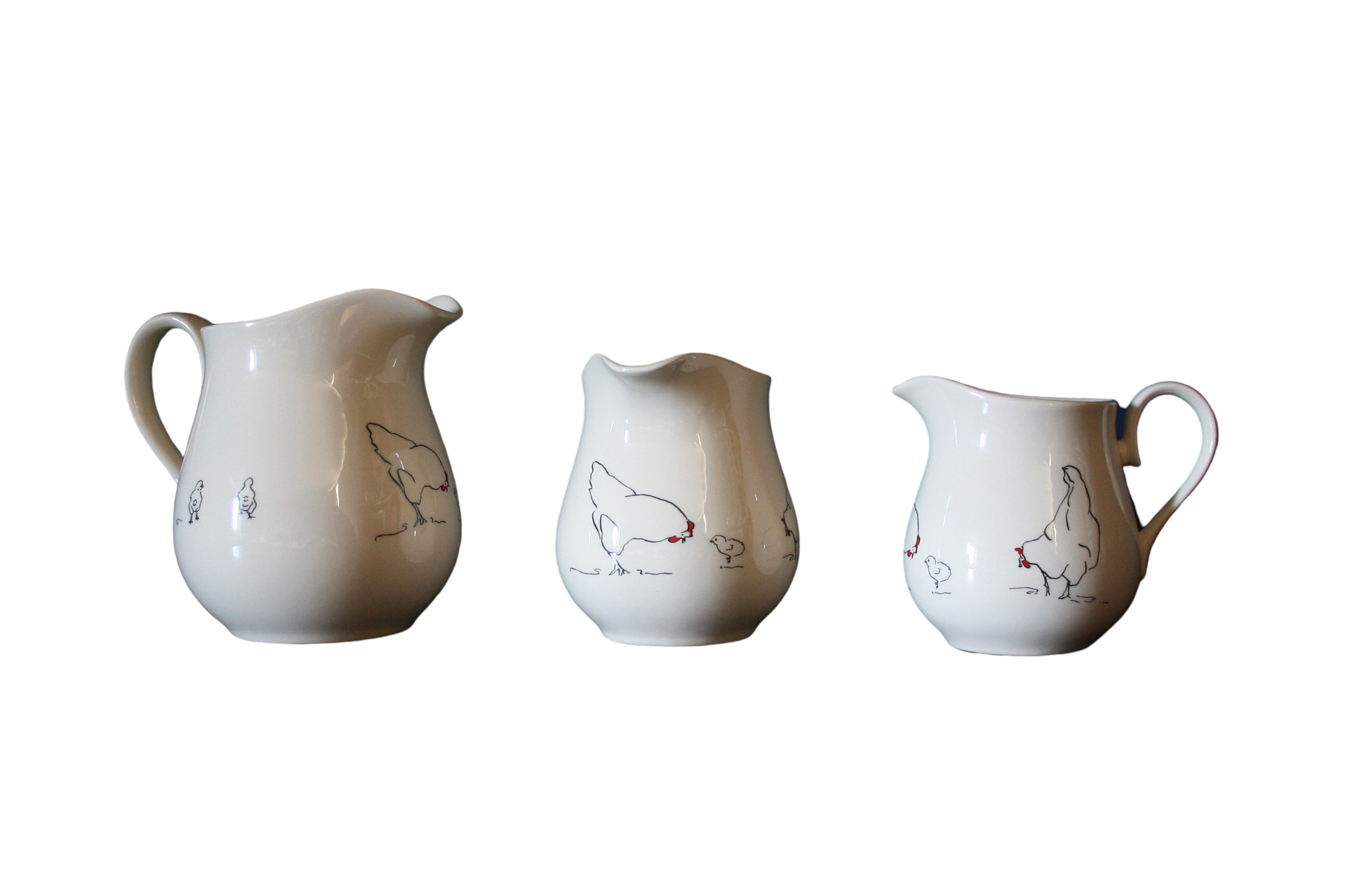 creamwear jug in three sizes with drawings of chickens, hens and chicks going round them