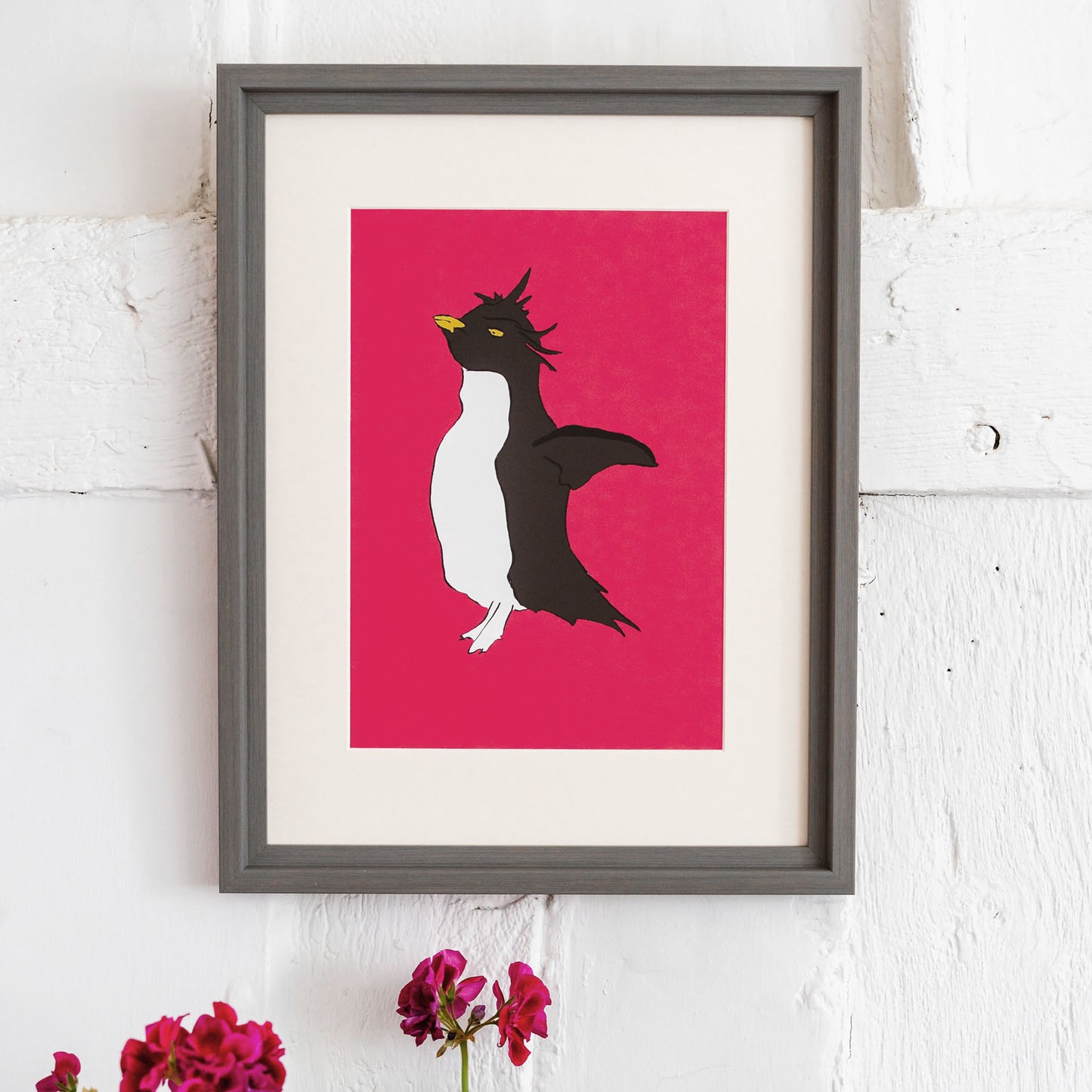 giclee print of a rockhopper penguin with a pink background