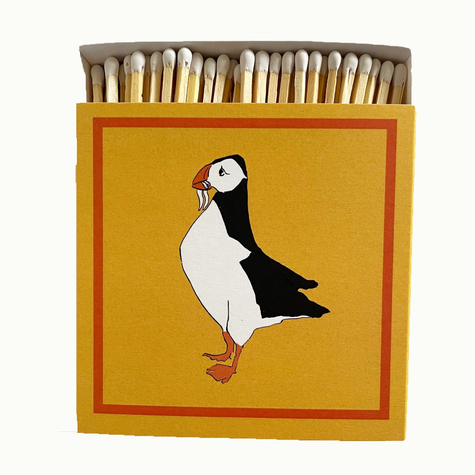 match box with puffin design on the front