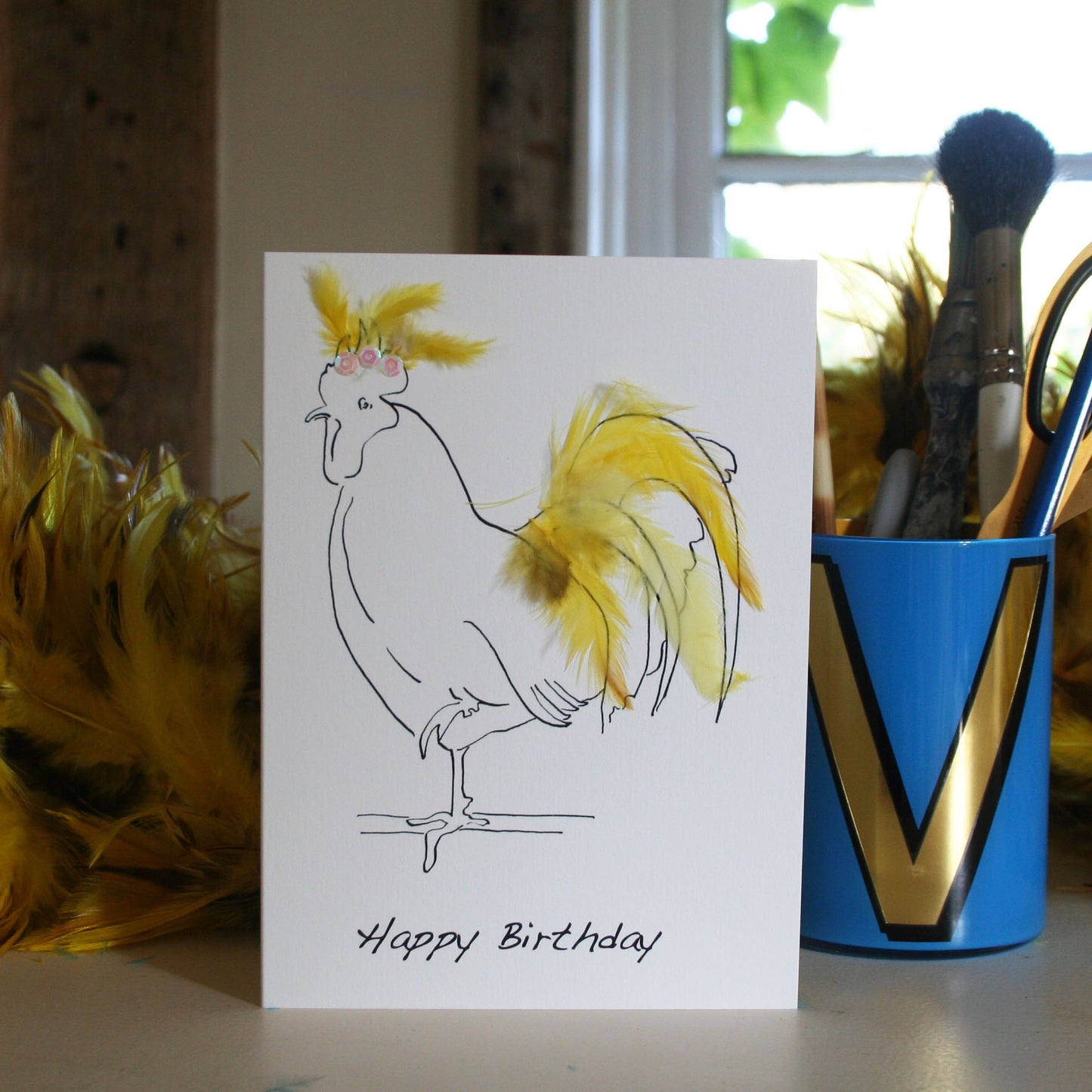 Hen card with real feathers in yellow